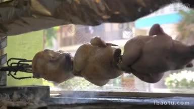 鸡旋转串拍摄烹饪烤鸡烧烤旋转吐槽在咖啡馆对着观景窗